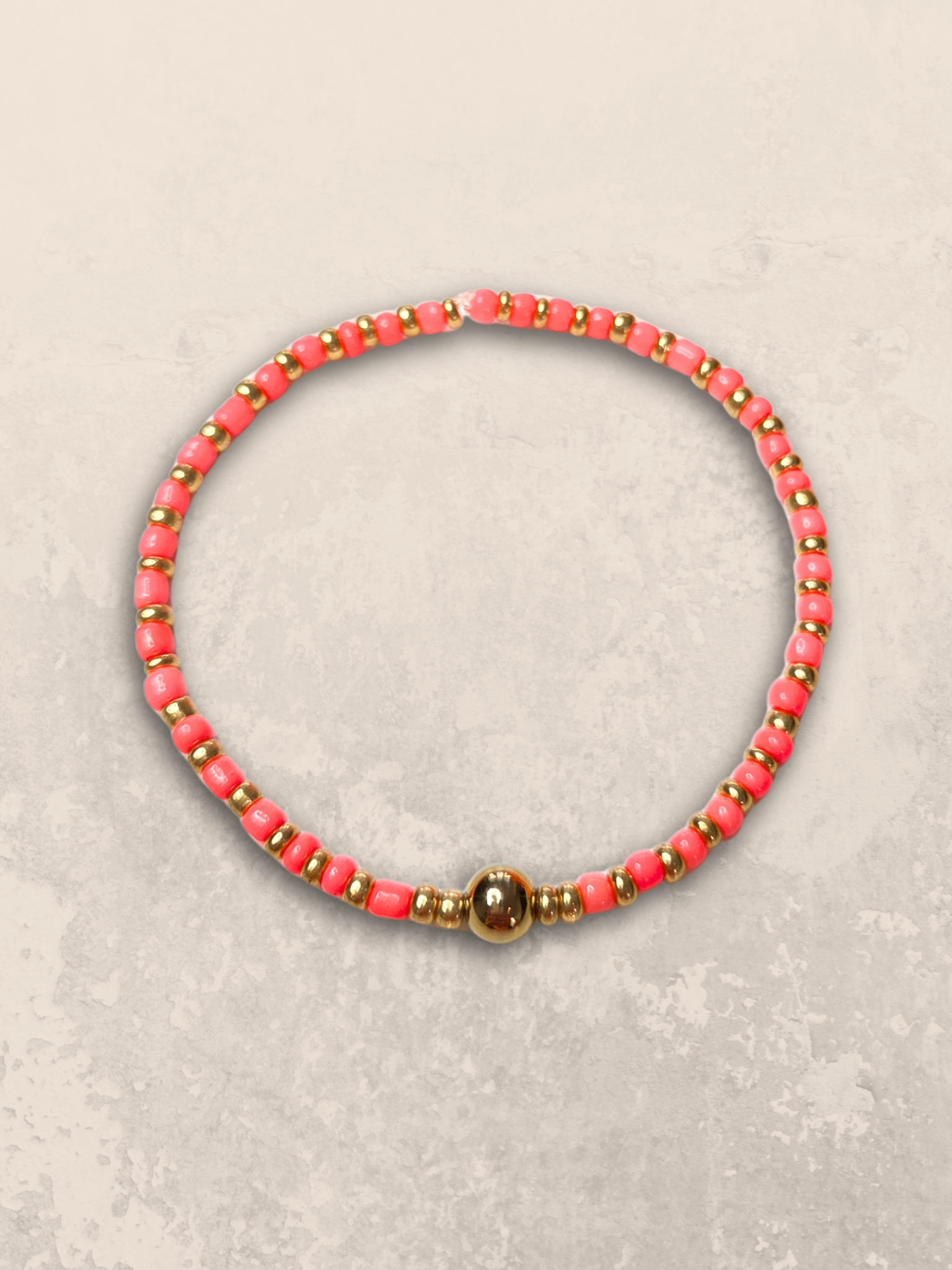 Elastische armband koraal